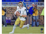 Ian Book Notre Dame Fighting Irish Fanatics Authentic Autographed 16" x 20" White Jersey Running Photograph with "PLAY LIKE A CHAMPION TODAY!" Inscription